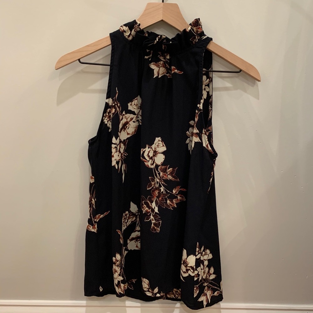 Blue blouse with floral designs